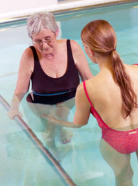 patient exercising in pool